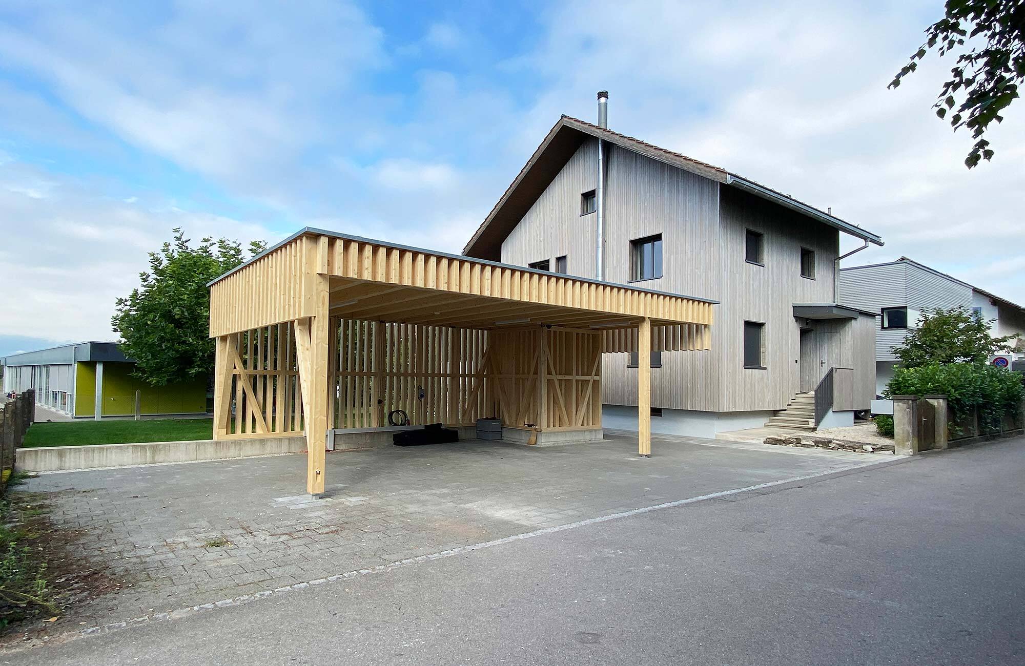 Sanierung Haus und Neubau Carport aus Holz